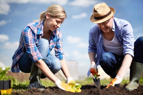 Professional gardeners caring for a Kingsbury garden