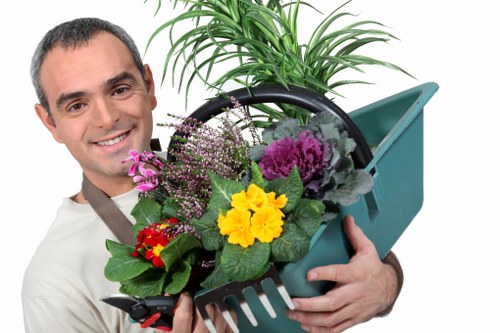 Gardener wearing PPE while carrying out maintenance work